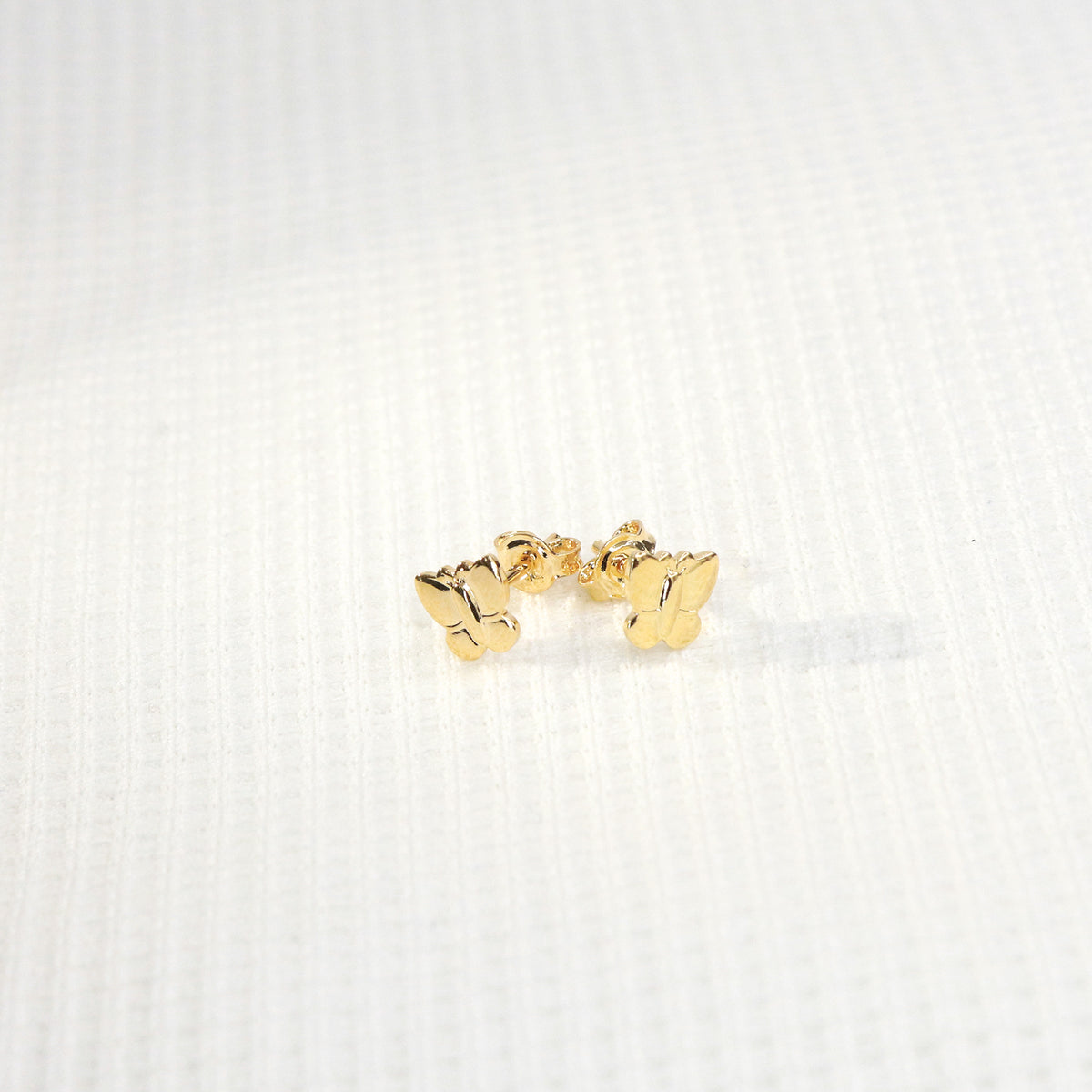 Topo Mariposa en oro laminado 18K