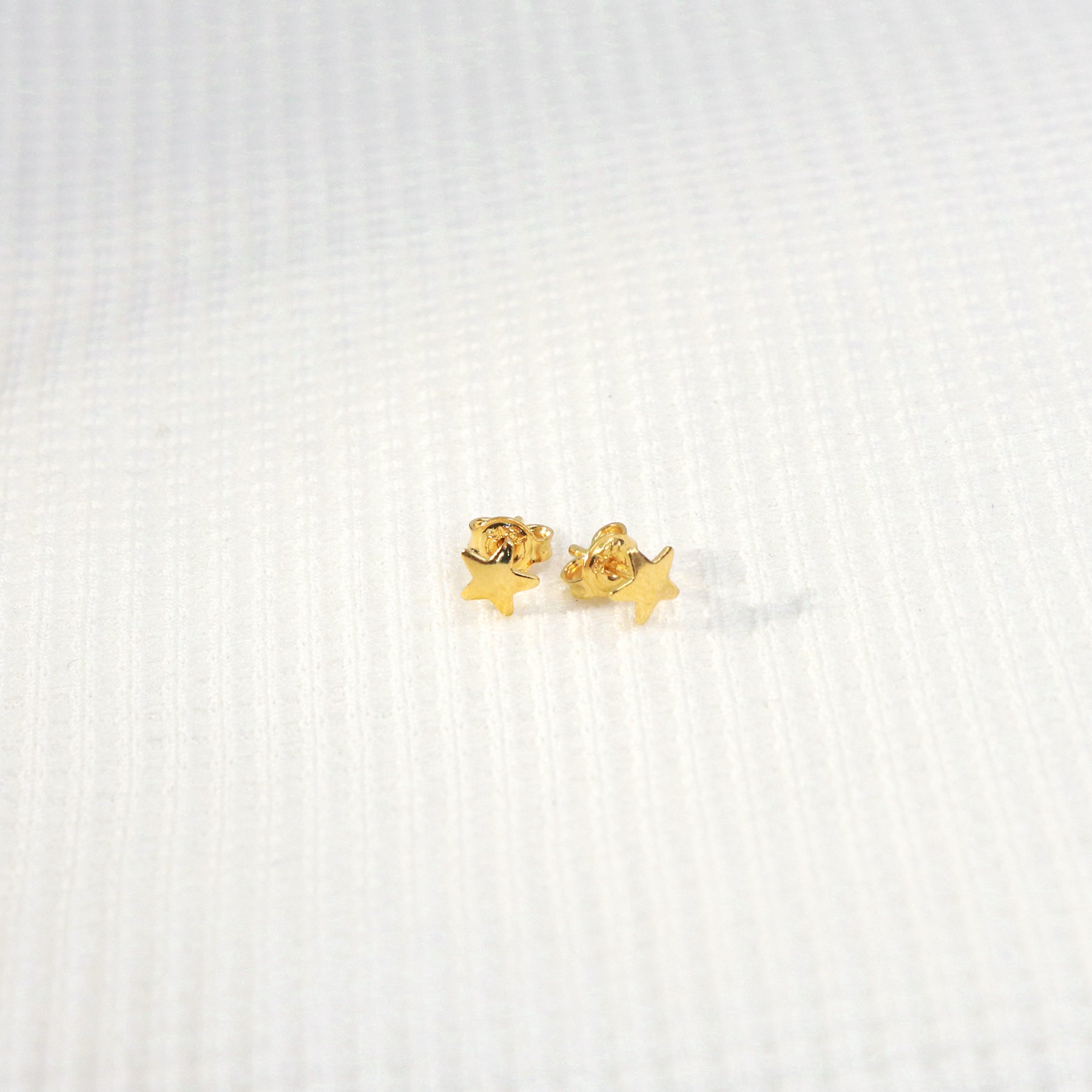 Topo Estrella Pequeña en oro laminado 18K