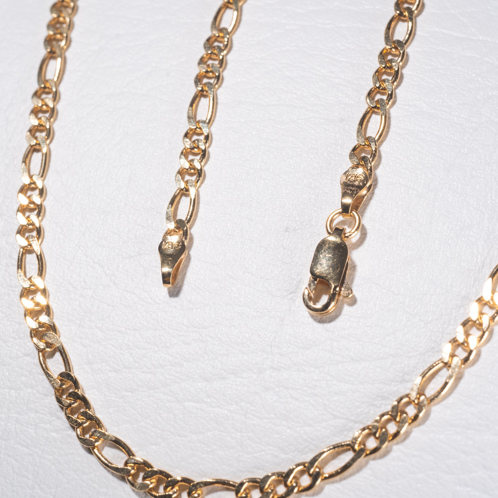 Cadena Figaro 3x1 en Oro laminado 18k para caballero