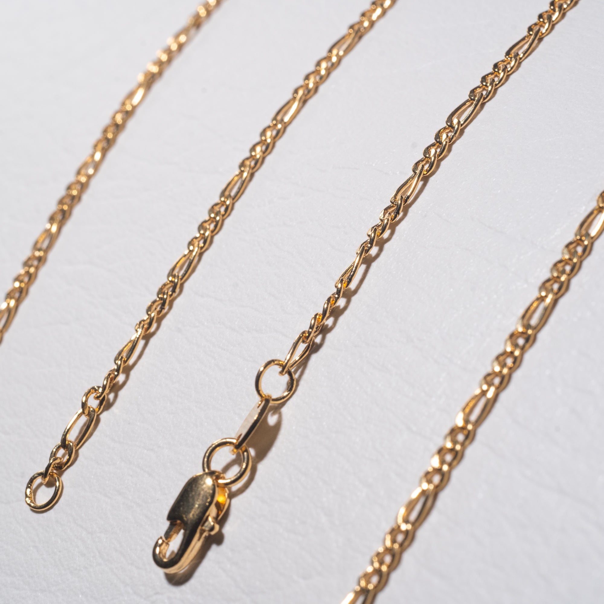 Cadena Figaro S en Oro laminado 18k para dama