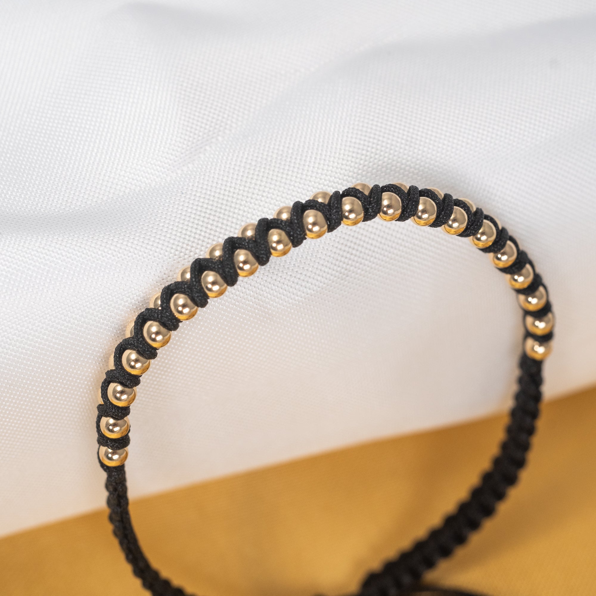 Pulsera balines en zig-zag artesanal en Oro laminado 18k unisex